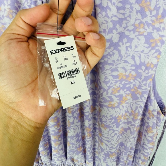 Express Printed Sleeveless Mock Neck Tiered
Ruffle Dress in lilac Purple Print - Picture 6 of 9